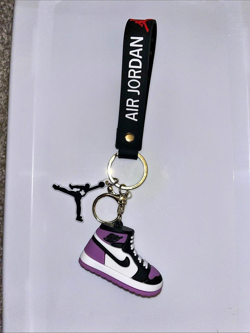 Charm Keychain in Black & Purple Like New
